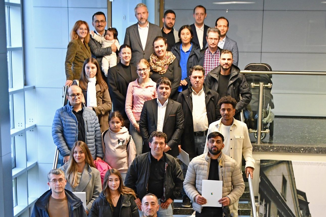 Gruppenfoto beim Einbürgerungsempfang im Oktober 2025