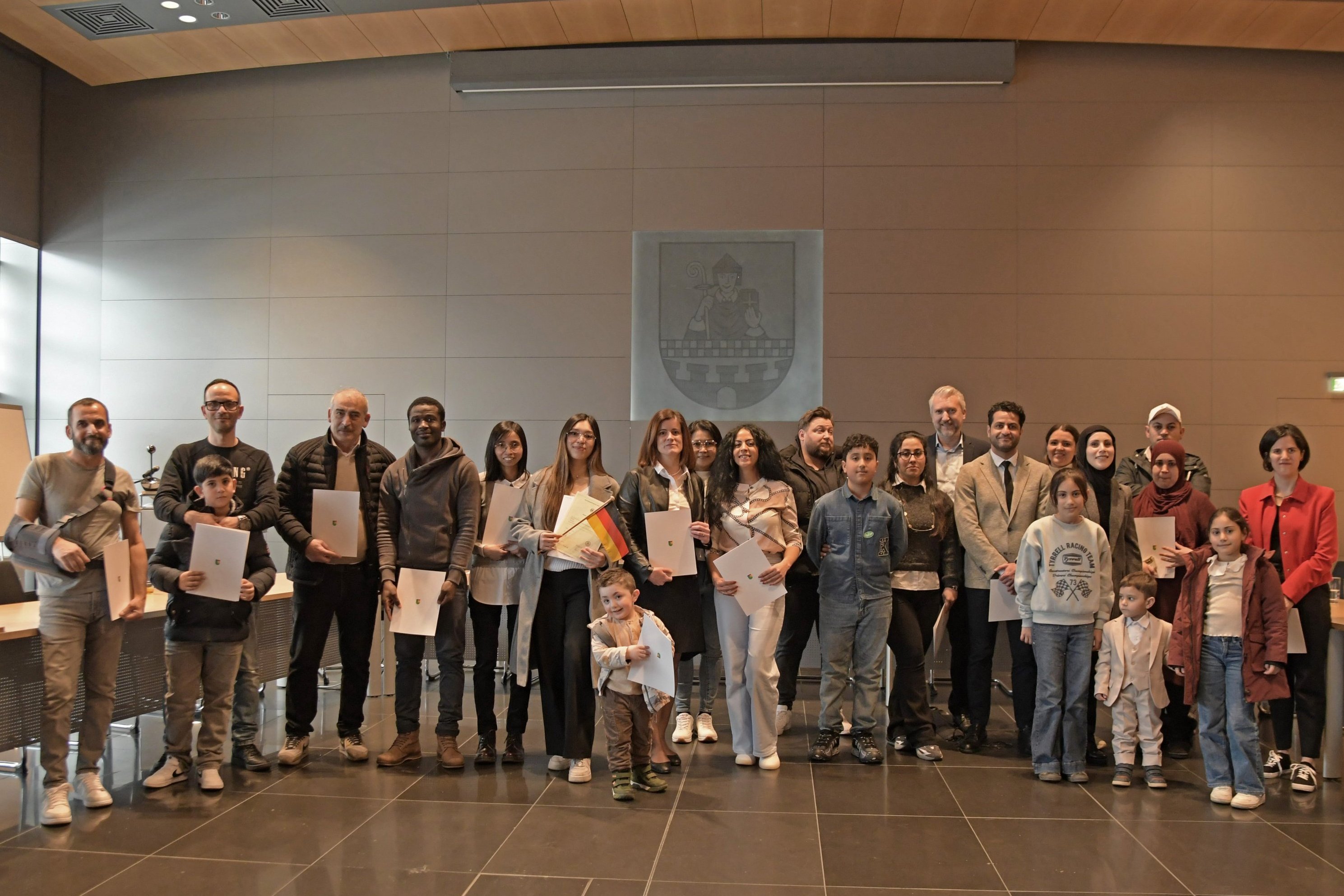 Gruppenfoto vom Einbürgerungsempfang im März 2026