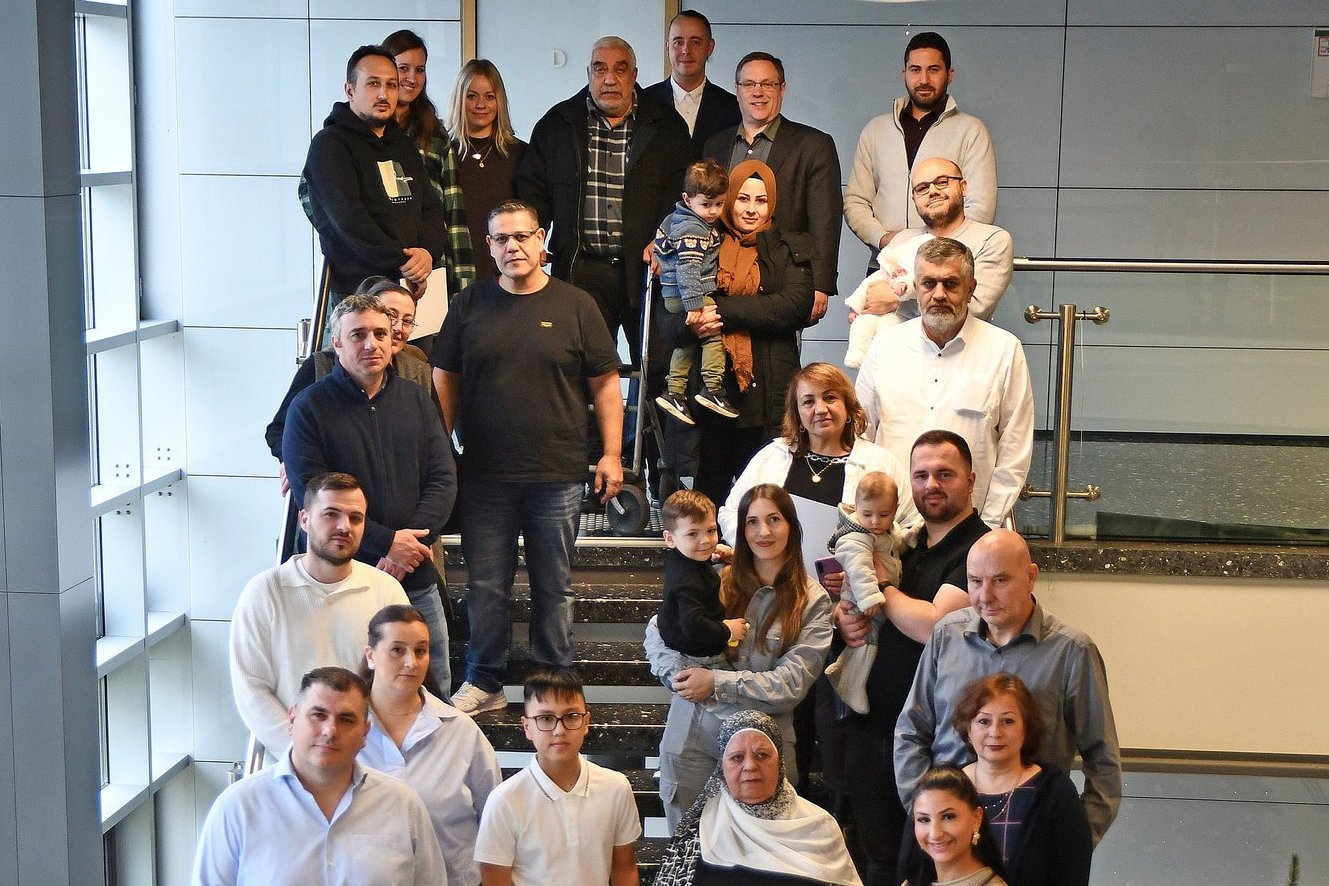 Gruppenfoto vom Einbürgerungsempfang im Dezember 2025